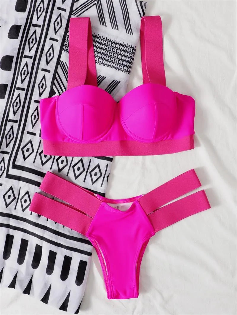 Women's rose red bikini set with steel bracket push-up board top and matching bottoms.