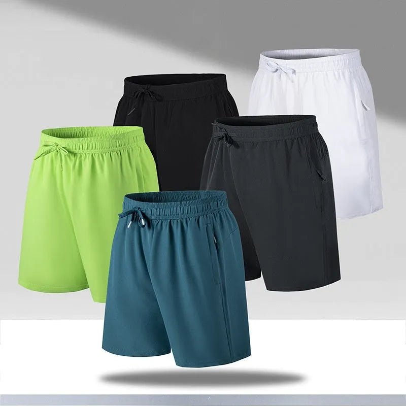 Man wearing loose light grey quick-dry polyester beach shorts on summer day