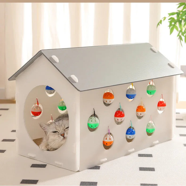 Integrated cat scratch board and nest toy with bell ball and tunnel features