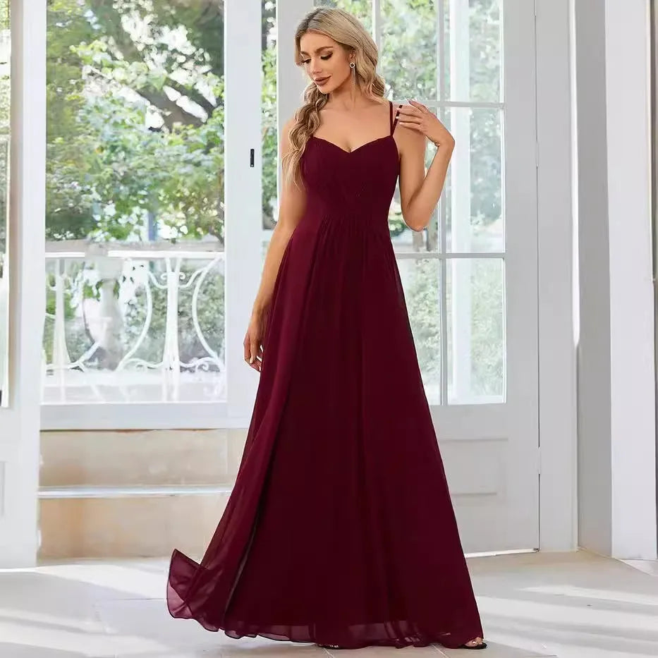 Women's sleeveless A-line pleated dress with sling neckline in light green colour