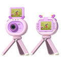 Purple and dark green children's digital camera with flip screen, silicone case lanyard, and USB cable