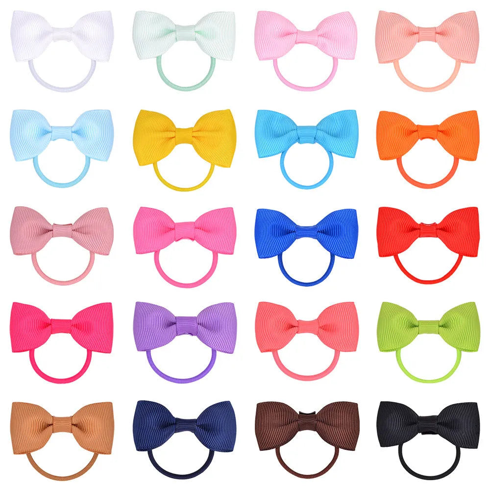 80 pieces of tiny hair bows with elastic bands in 40 colour pairs for baby girls