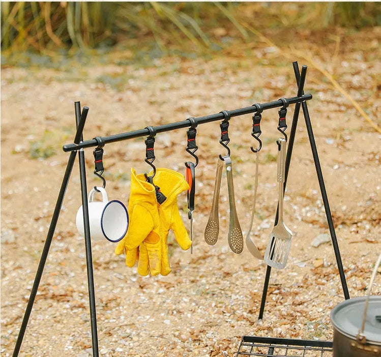 Large foldable aluminium alloy triangle frame camping drying rack with multiple hooks, shown with optional side hanger and top tray.
