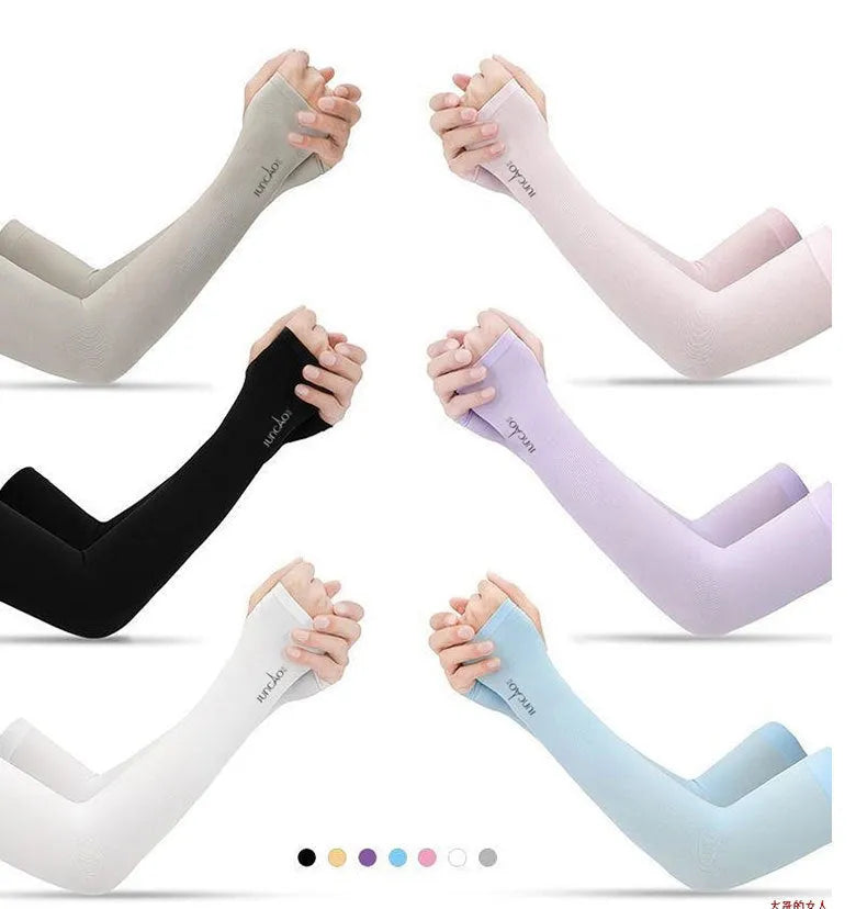 A person wearing a light grey nylon sun protection oversleeve on their arm with open fingers, suitable for driving.
