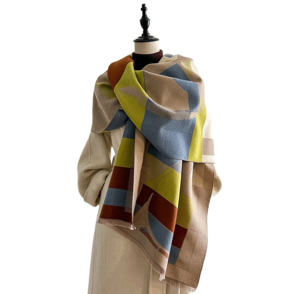 Beige imitation cashmere scarf draped to show its 185cm length and 65cm width.