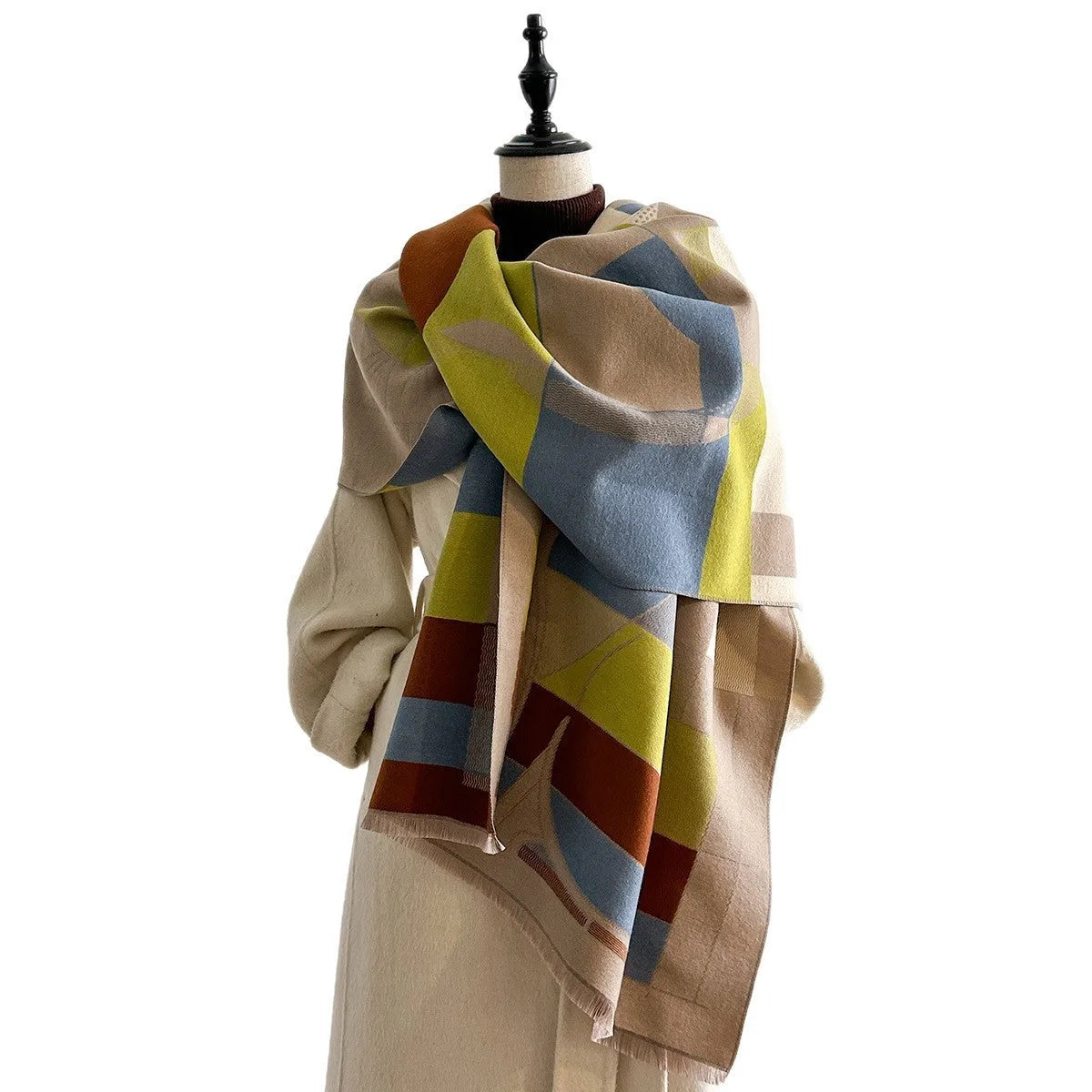 Beige imitation cashmere scarf draped to show its 185cm length and 65cm width.