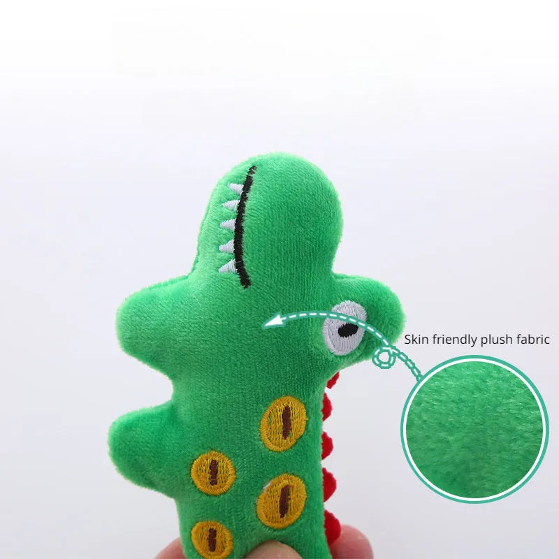 Plush cat toy shaped like a cow, crocodile, or parrot on a plain background.