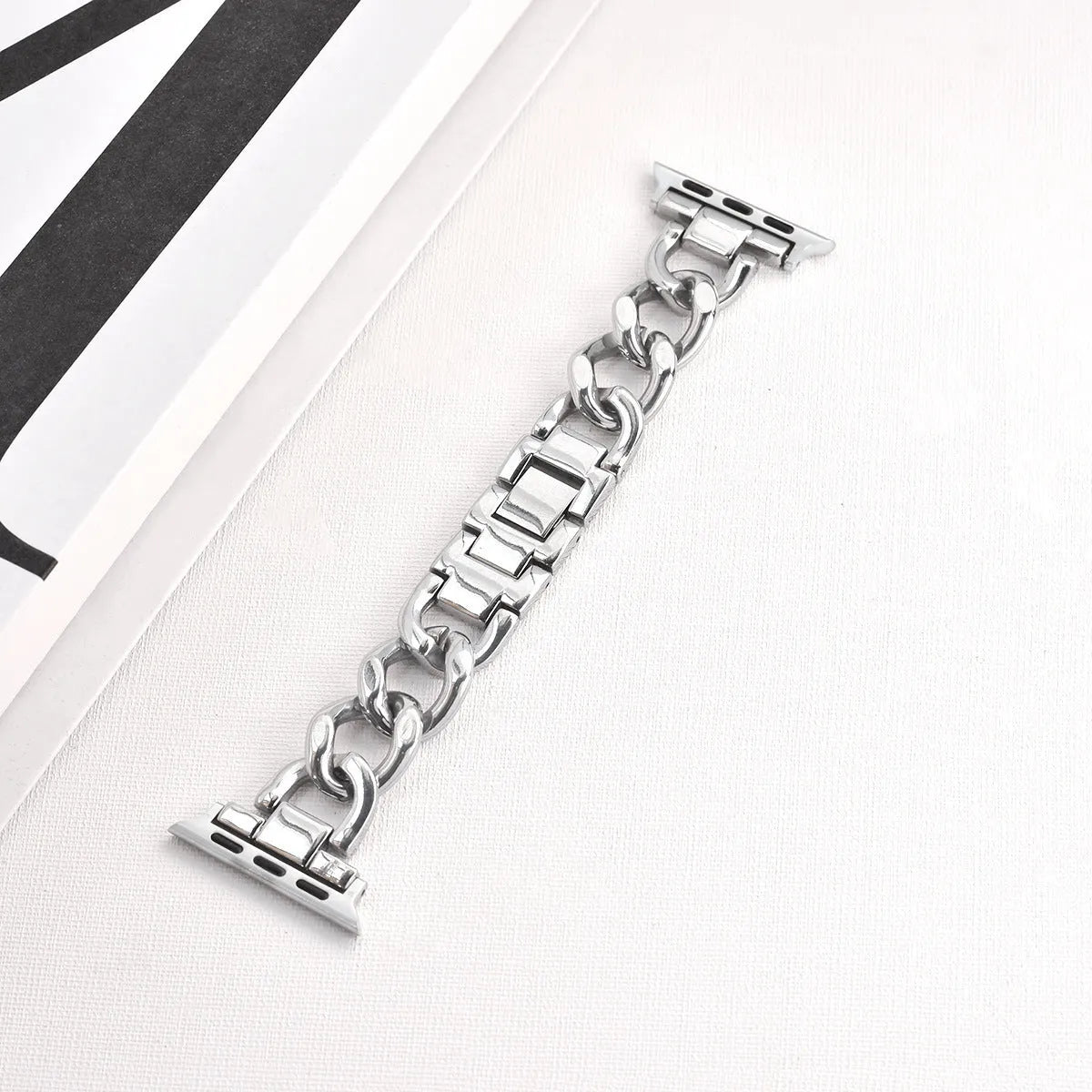 Silver metal chain link Apple Watch strap with 22mm lugs on a watch case