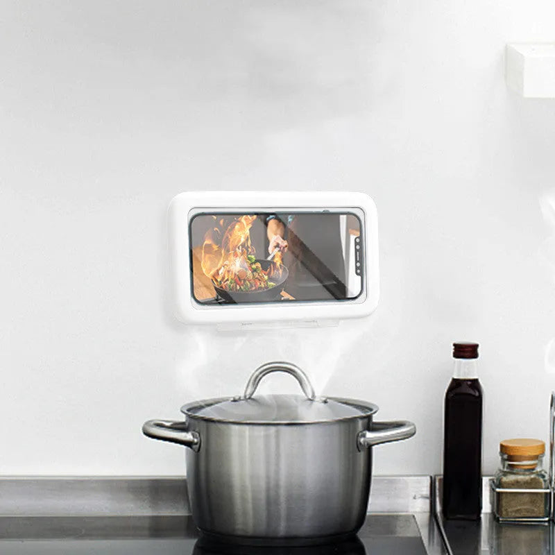 Waterproof bathroom phone case with touch screen mounted on tile, showing anti-fog window and universal phone fit