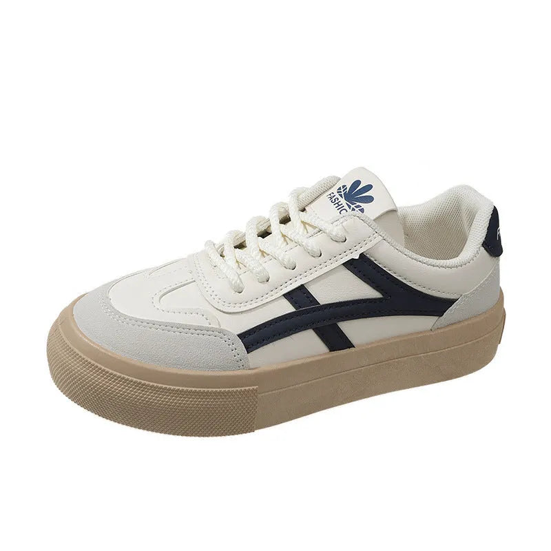 Brown and blue low-top casual lace-up shoes with a patent leather-look finish and flat rubber sole.