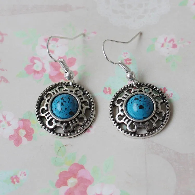 Handmade geometric flower disk earrings with Miao silver and turquoise ethnic design