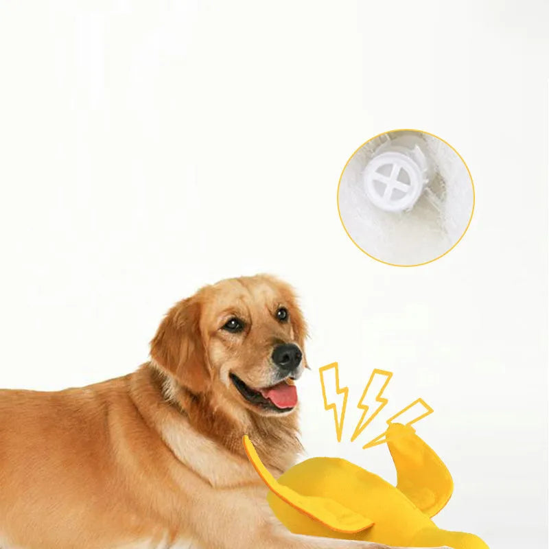 Yellow teddy duck dog toy with food leak openings and squeaker for training and chewing