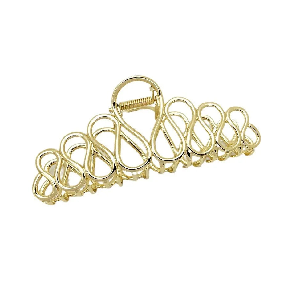 Large minimalist alloy hair clip with tassel detailing in gold or silver finish for women's updos