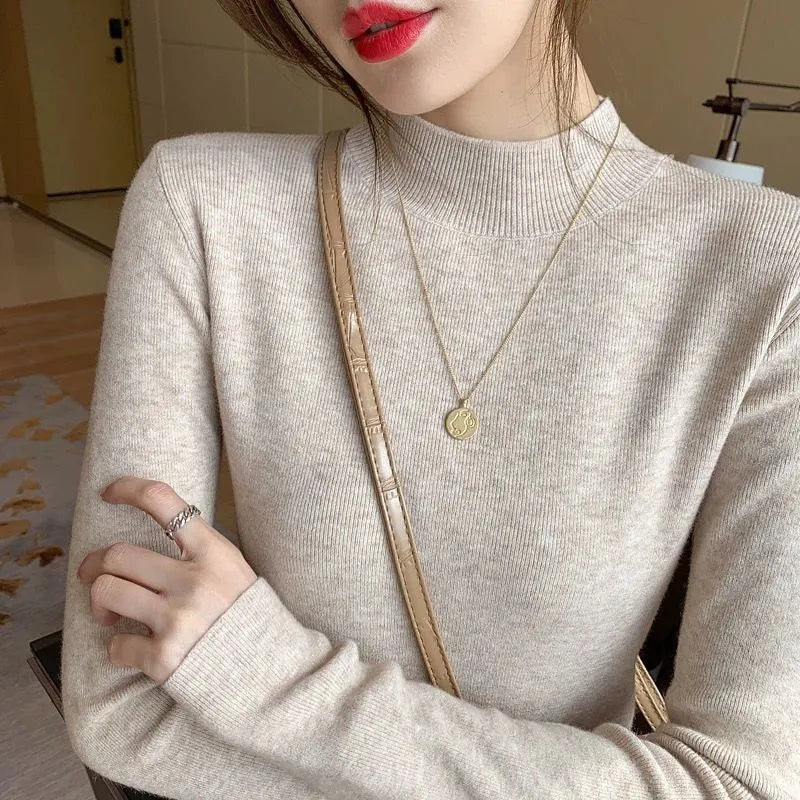 Slim fit long sleeve knitted shirt in viscose fibre shown in apricot colour