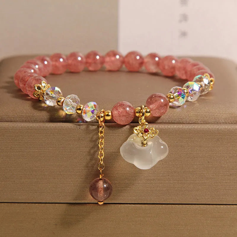 Women's strawberry quartz crystal bracelet with white agate beads and auspicious cloud charms
