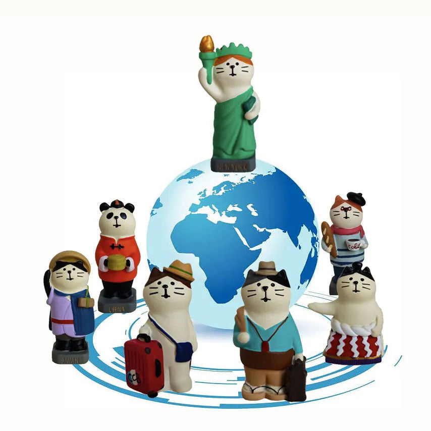 Cartoon resin figurine of a Statue of Liberty cat holding a globe, decorative craft ornament.