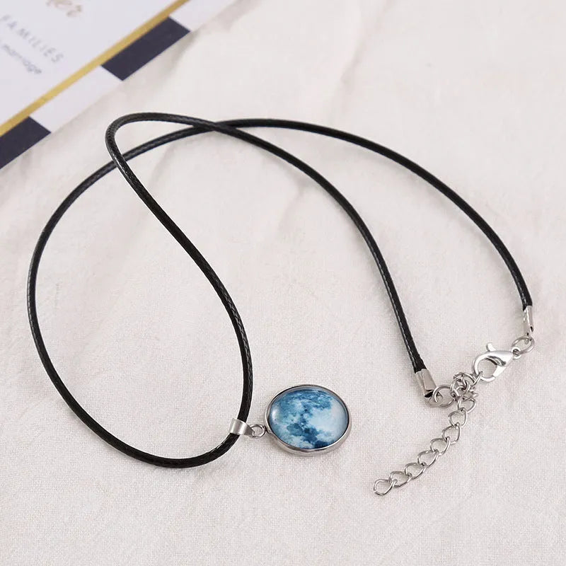 Luminous moon and night sky constellation pendant necklace on an alloy chain, simple unisex style.