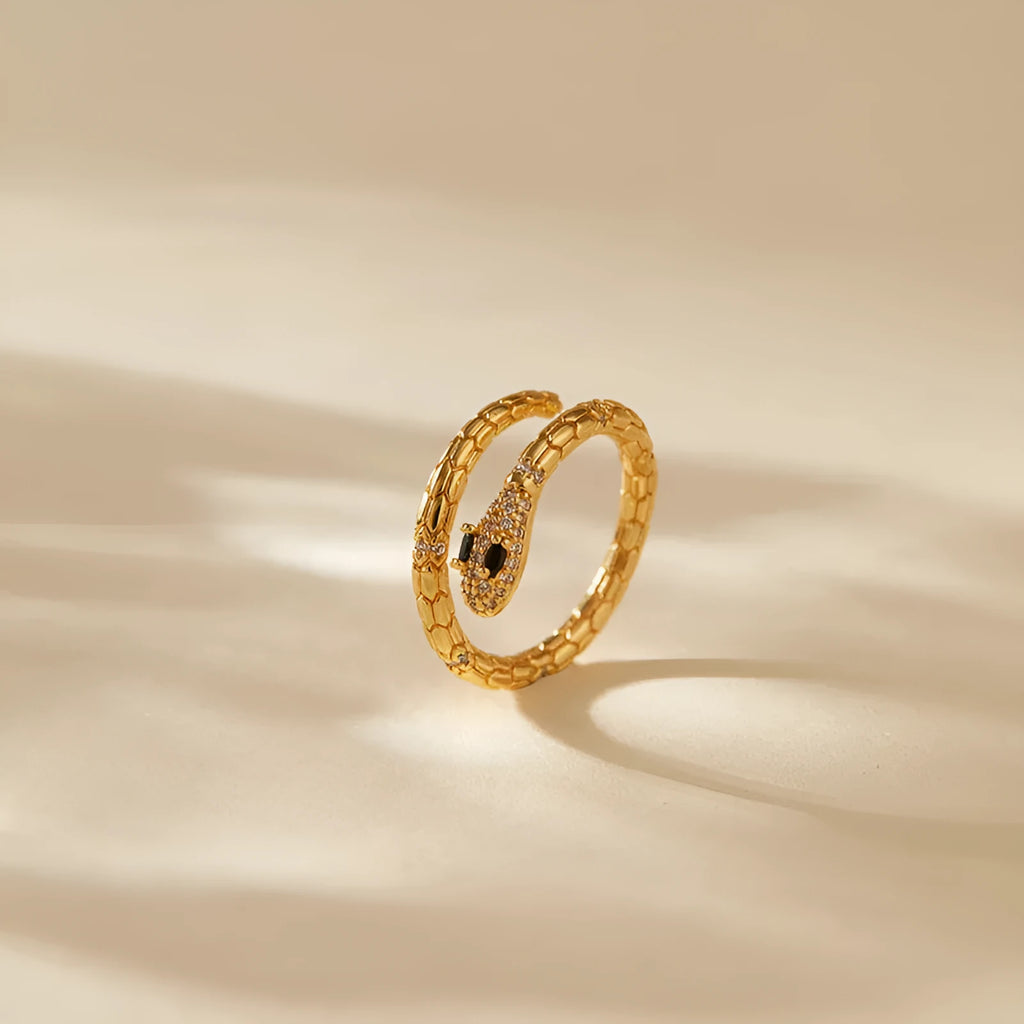 Snake-shaped adjustable index finger ring with copper construction and 18K gold colour finish