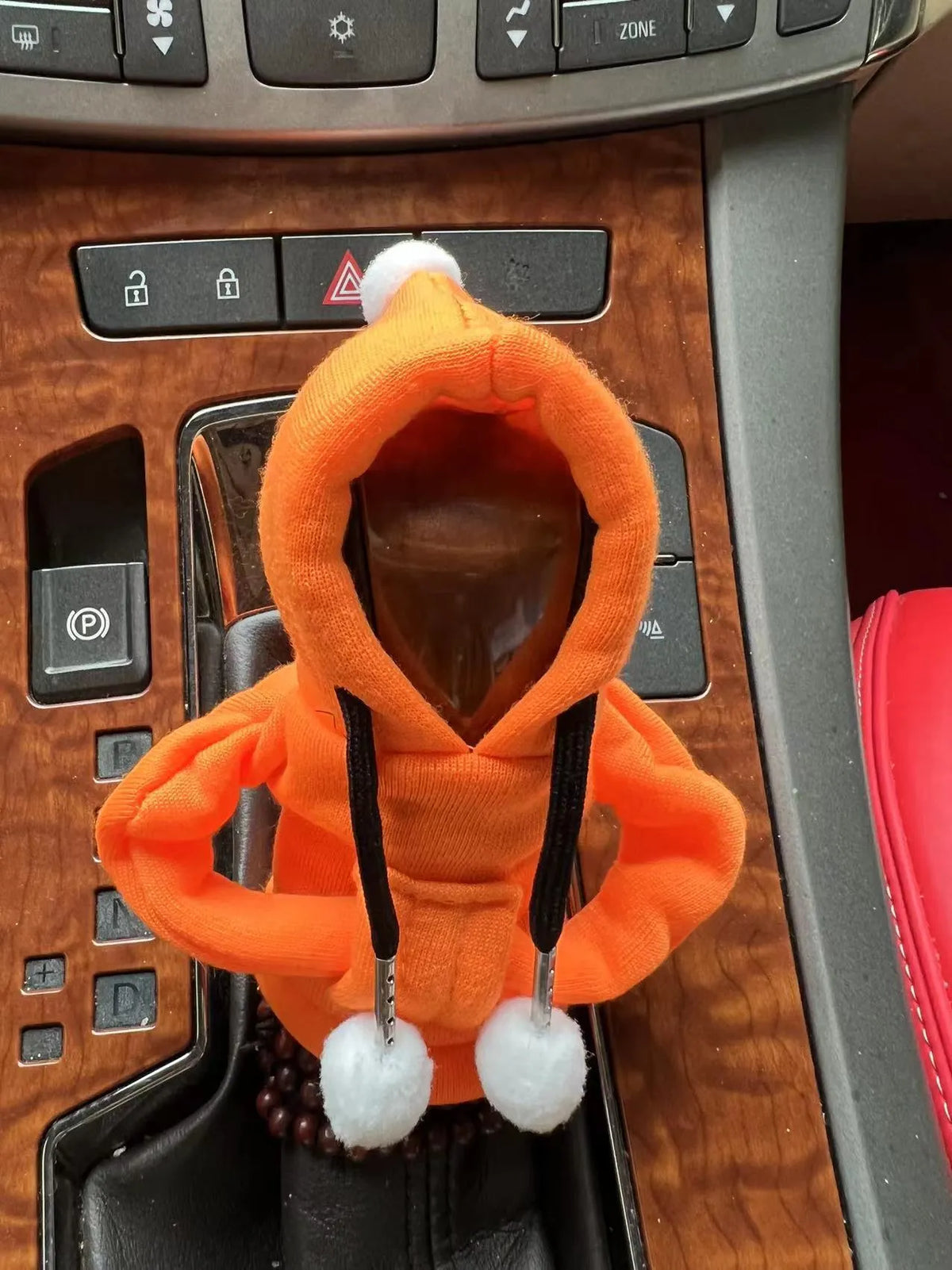 Santa Claus car gear lever cover in black or pink fabric with hooded sweatshirt design, fitting gear shift knob and handbrake.