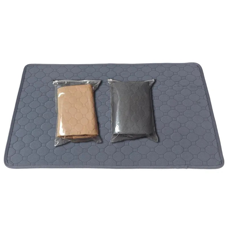 Washable dog pee pads in neutral tan and grey colours measuring 18x24 inches