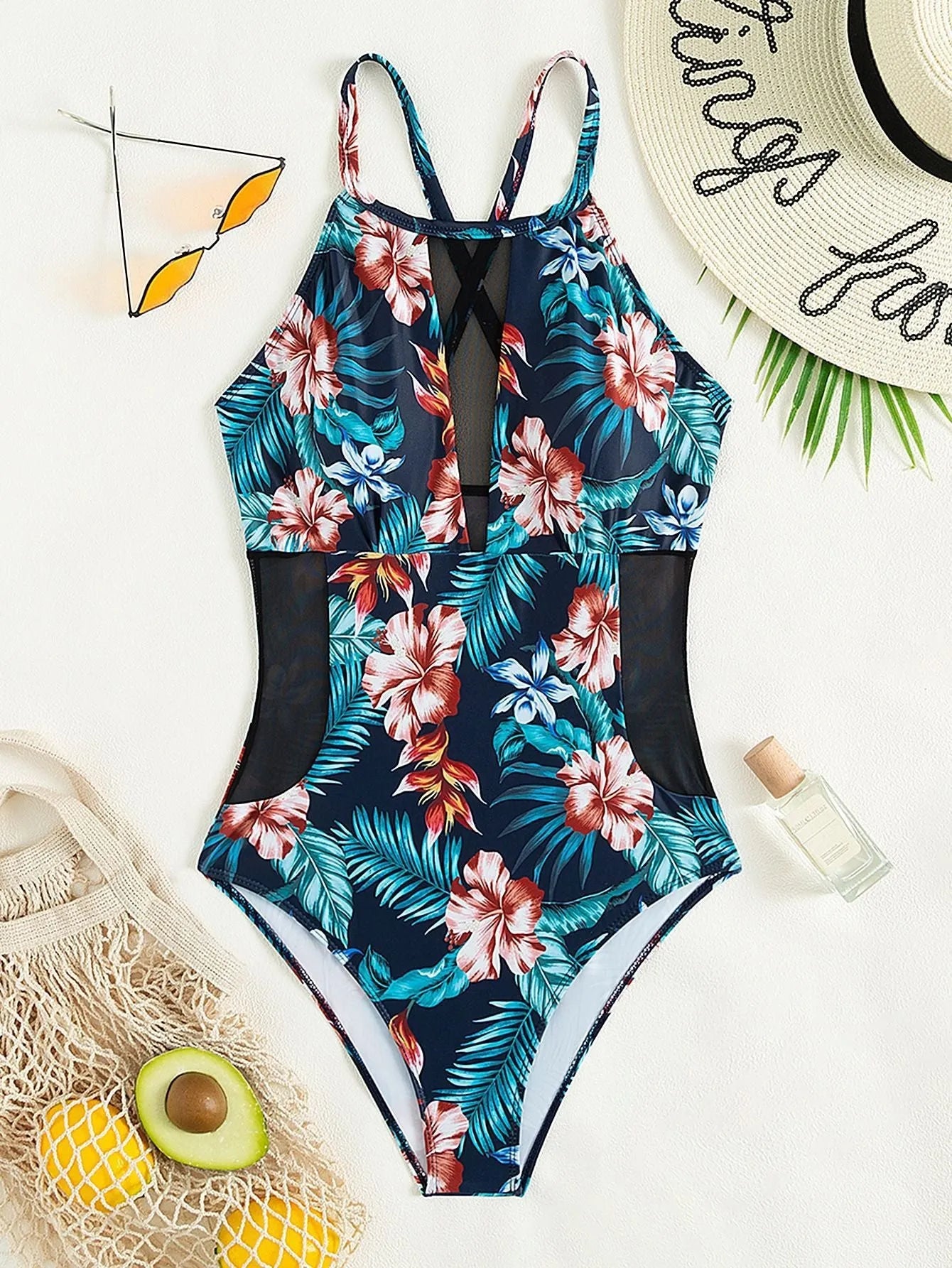 Women's deep V neck one-piece swimsuit in a solid colour or gradient print pattern.
