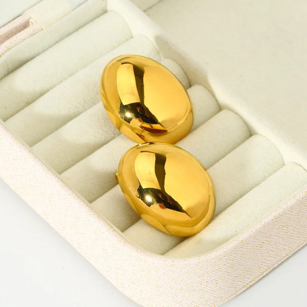Geometric earrings with exaggerated glazed surface and 18K gold colour electroplated finish
