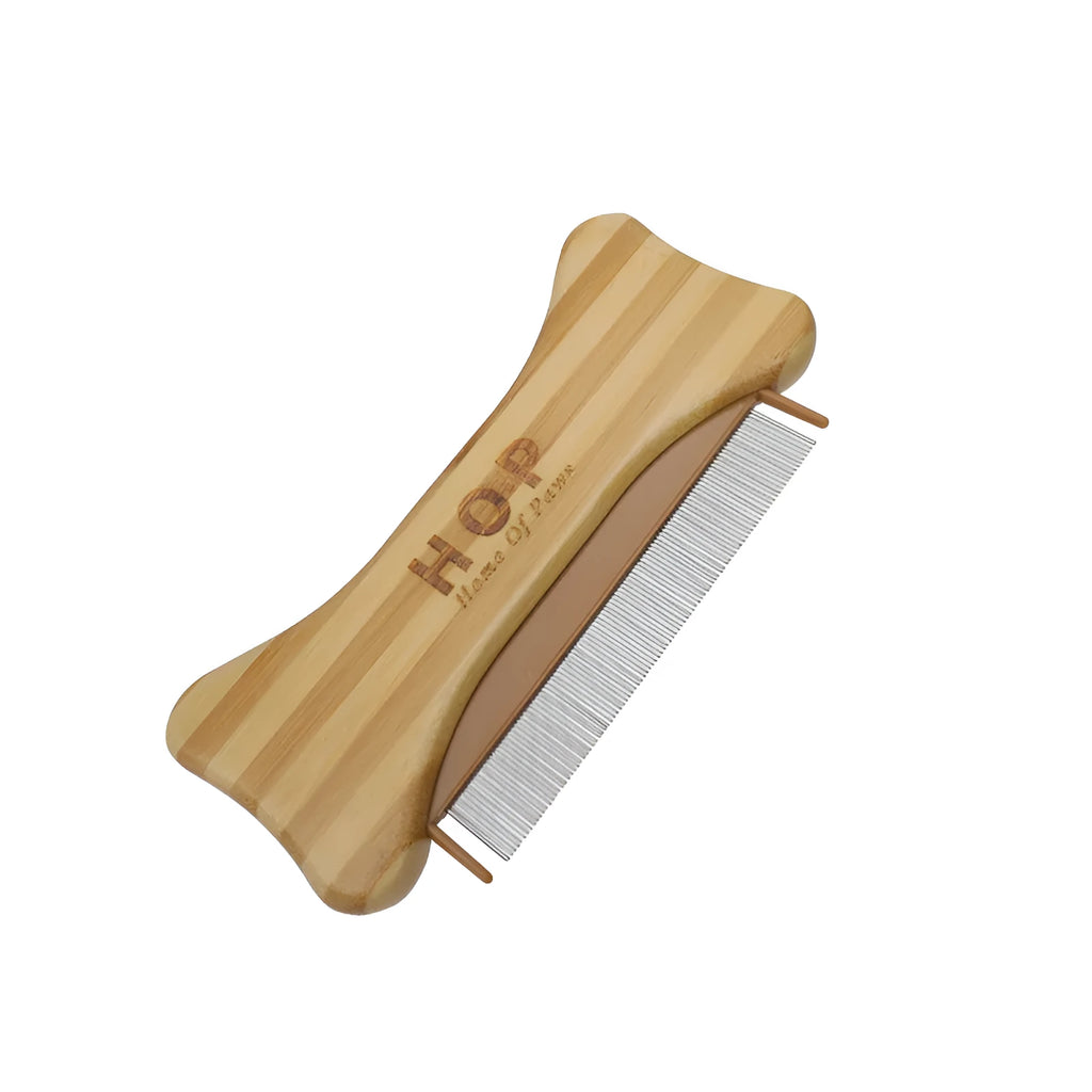 Double-sided bamboo dog flea comb in colour bamboo finish featuring needle pins for grooming