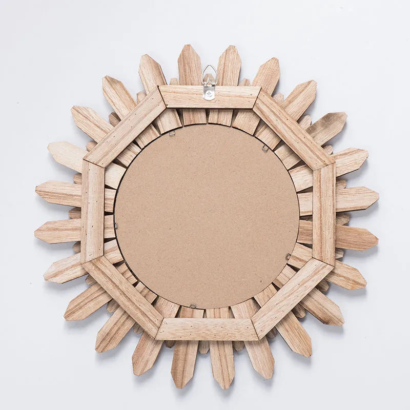 Round solid wood hanging mirror with European-style baked colour finish on a wall.