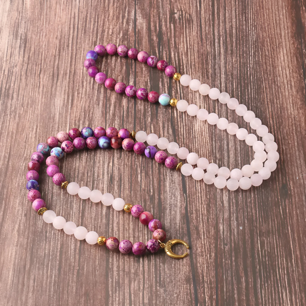Pink Emperor Stone crystal necklace with round bead pendant on model