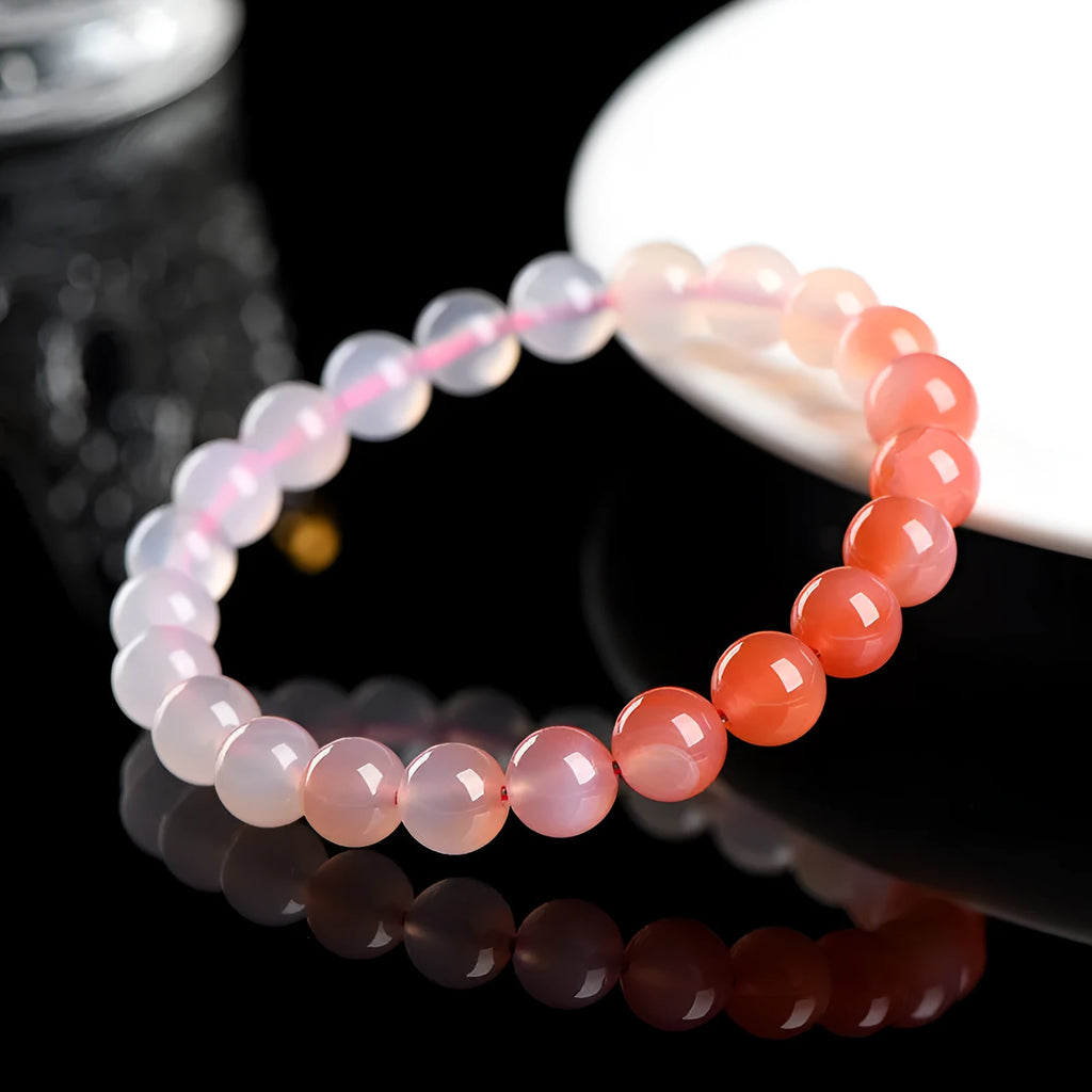 Yanyuan agate bracelet showing gradient salt source colour on wrist, with geometry style beads.