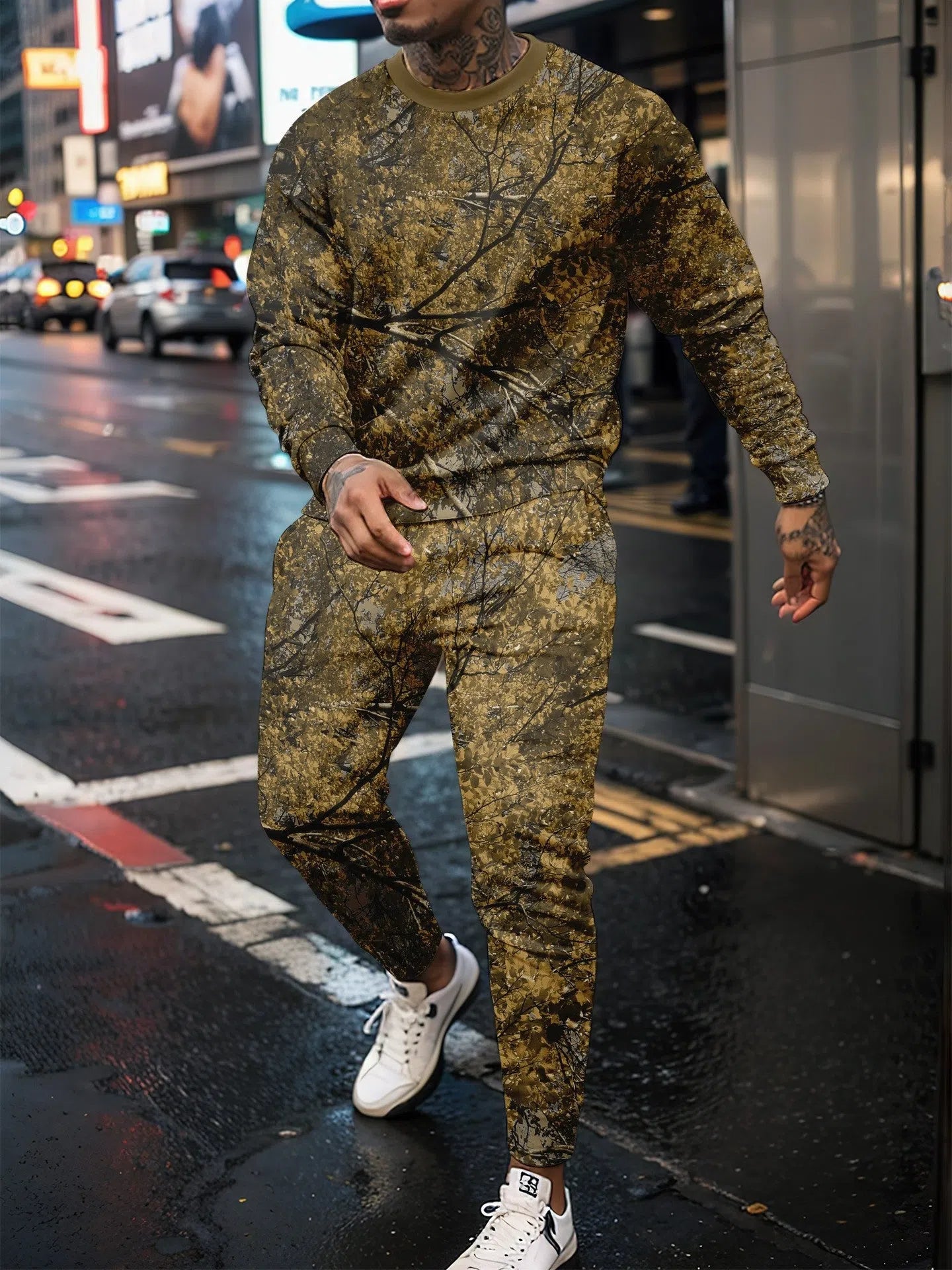 Two-piece jungle camouflage sportswear set with long-sleeve round neck top and matching trousers on a male model