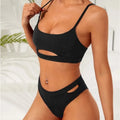 Black hollow solid colour women's bikini set with sleeveless top and brief bottom on model