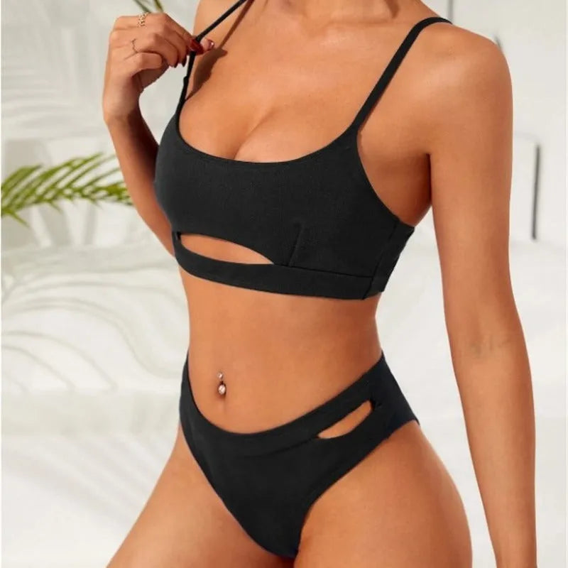 Black hollow solid colour women's bikini set with sleeveless top and brief bottom on model