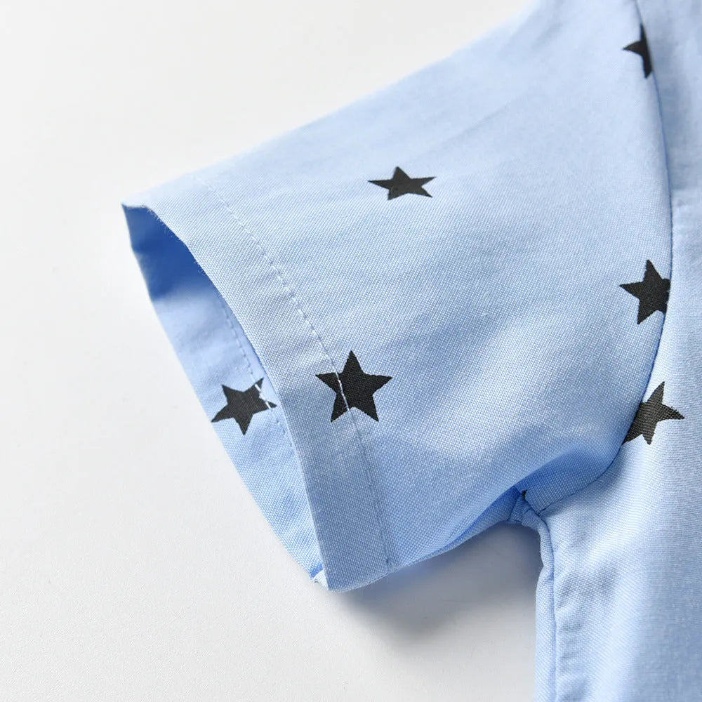 Light blue cotton three-piece children's suit with waistcoat, short sleeve shirt, and shorts for boys