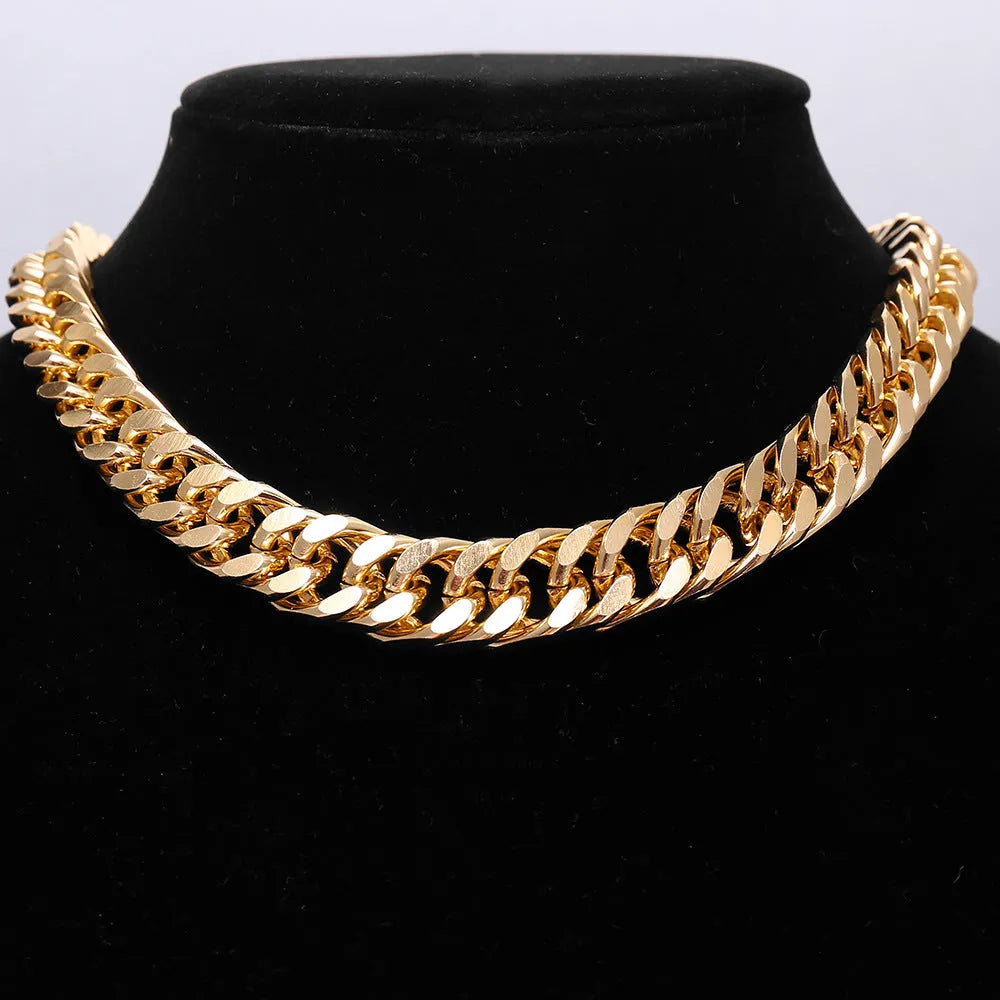 Gold coloured thick chain necklace for women, 32cm long with a 6cm pendant drop.