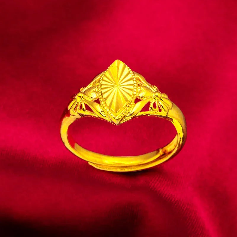 Electroplated gold brass ring with geometric open diamond floral design and textured detailing