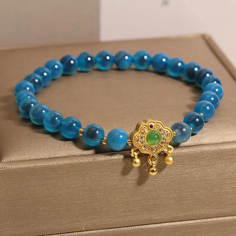 Blue sugar heart agate safety lock pendant bracelet for women with crystal construction and rhinestone detailing