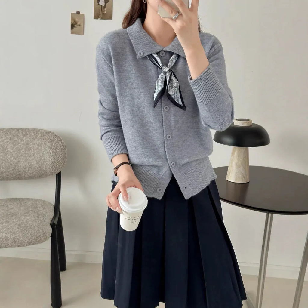 Lapel scarf cardigan sweater in acrylic, shown in milky white, grey, black, and navy blue colour options.