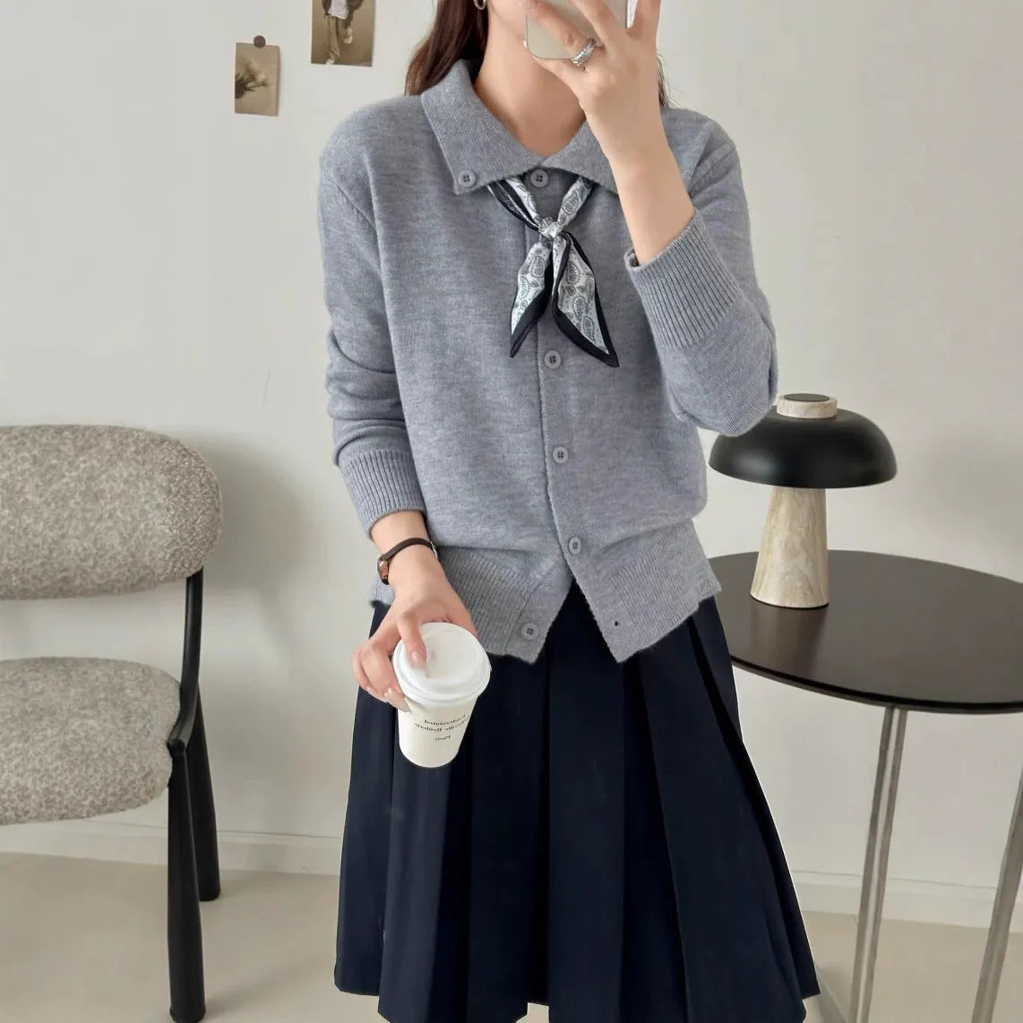 Lapel scarf cardigan sweater in acrylic, shown in milky white, grey, black, and navy blue colour options.