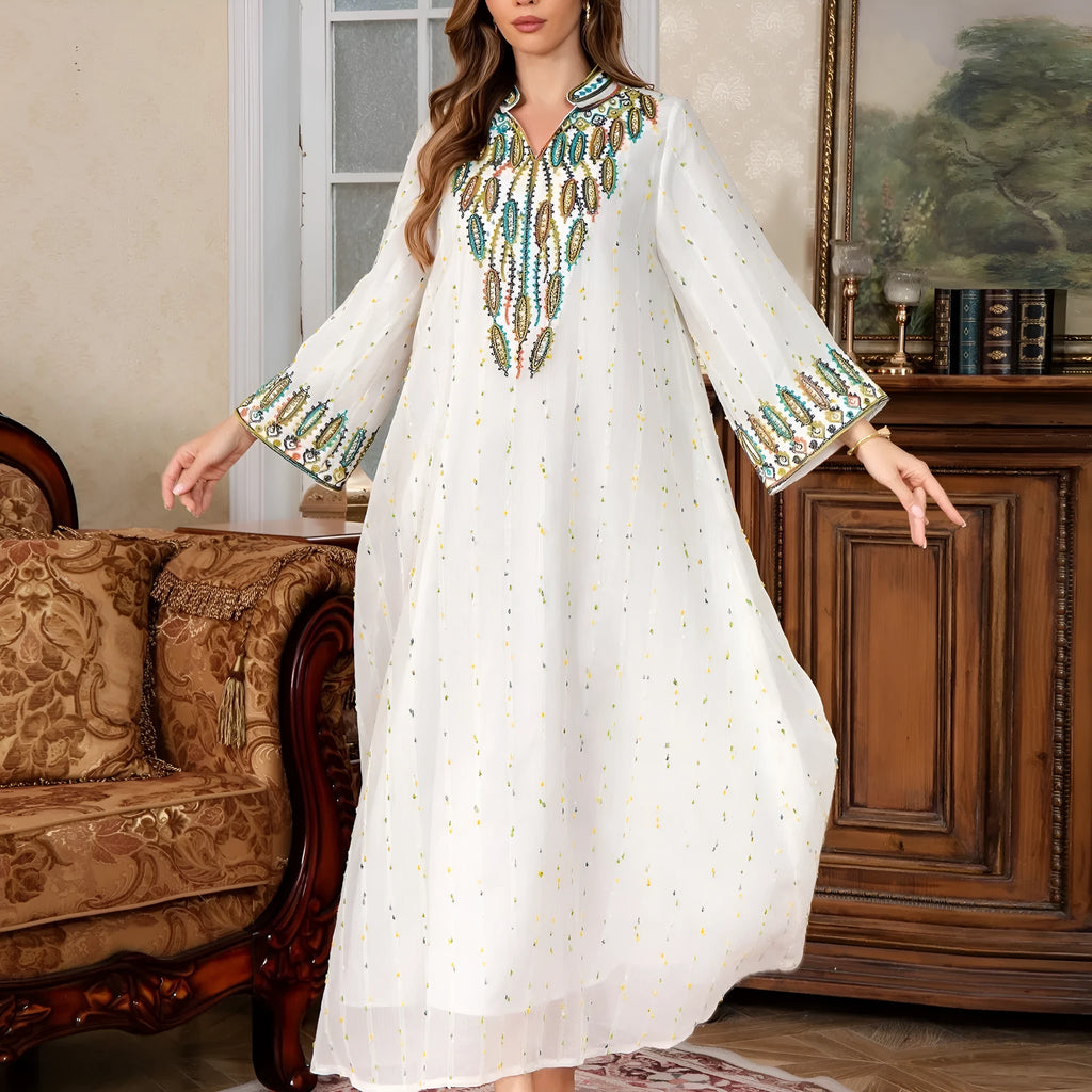 Women's white Arabic robe dress with long sleeves and floor-length skirt in polyester fabric