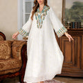Women's white Arabic robe dress with long sleeves and floor-length skirt in polyester fabric