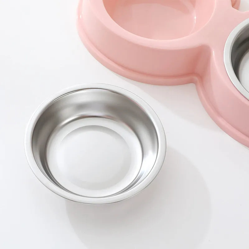 Stainless steel pet double bowl with frog design featuring separate food and water compartments