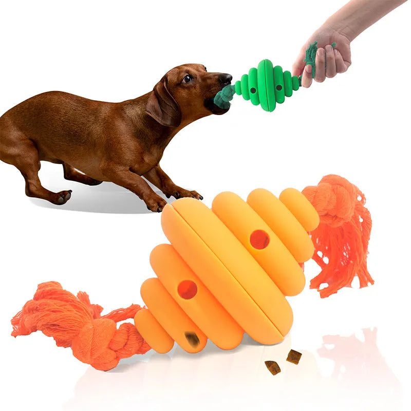 Green and yellow silicone dog ball with attached rope for tug-of-war and treat dispensing