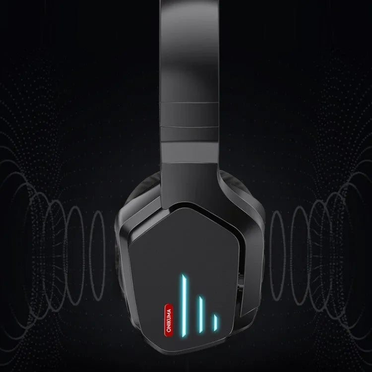 Luminous black wireless head-mounted stereo headphones with ear cups and headband on a grey background.