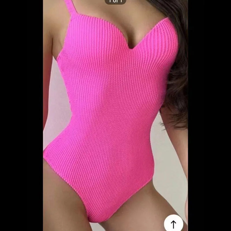 Women's one-piece swimsuit with a sunken stripe pattern in various colours.