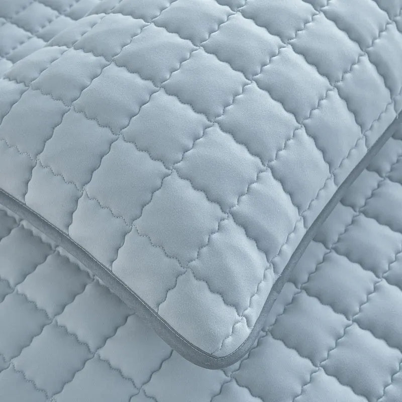 Waterproof washed cotton fitted sheet for bed protection in blue, shown on a UK double mattress.