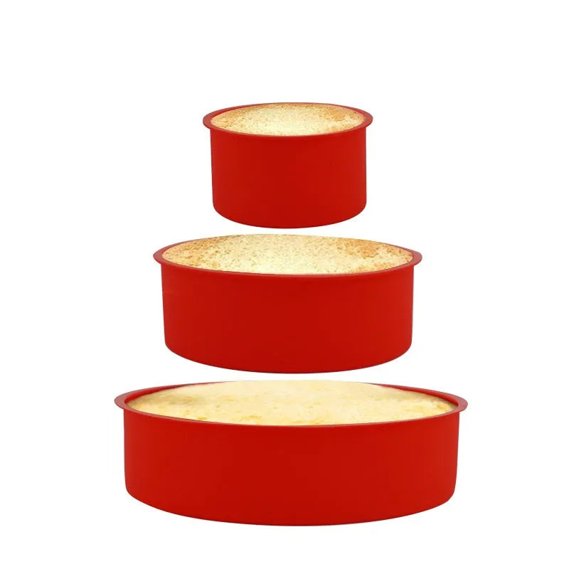 Set of three round red silicone cake moulds in 4-inch, 6-inch, and 8-inch sizes.