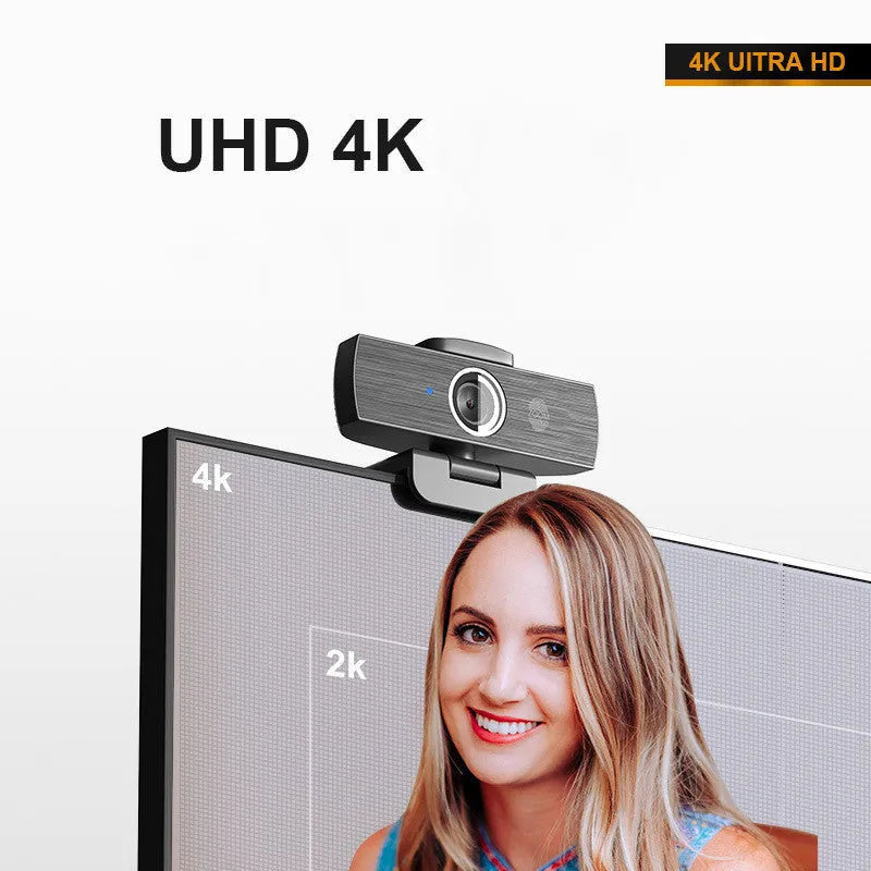 Black 8MP USB webcam with magnetic privacy cover on desktop