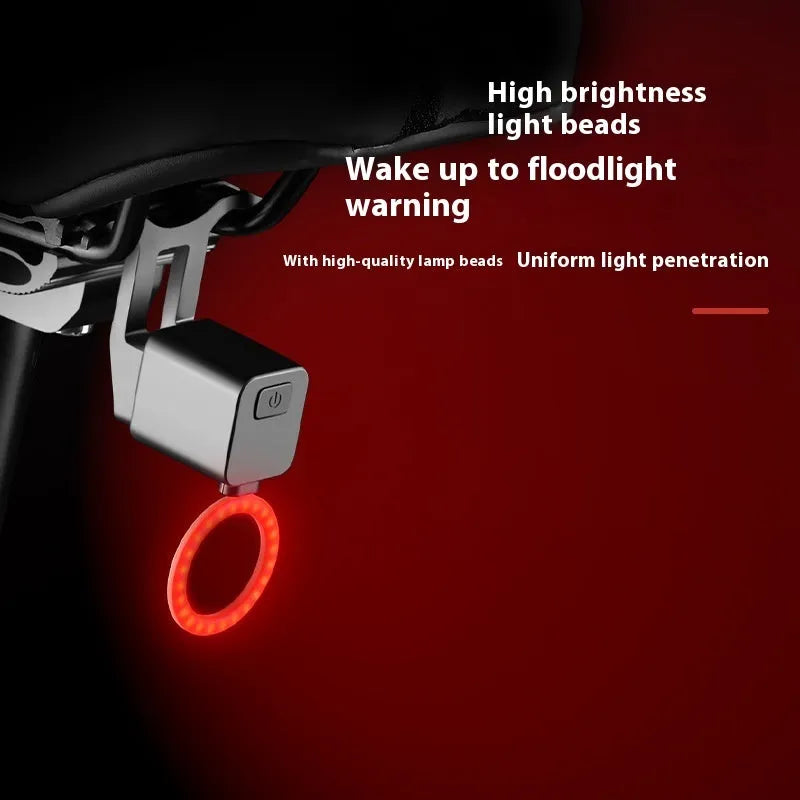 Bicycle tail light with flowing water illumination pattern for seat tube or saddle mounting