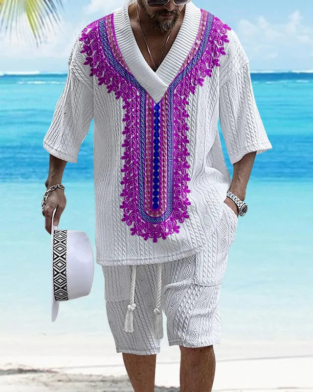 Man wearing a printed drop-shoulder knitted short sleeve top with matching shorts, a casual two-piece loungewear set.